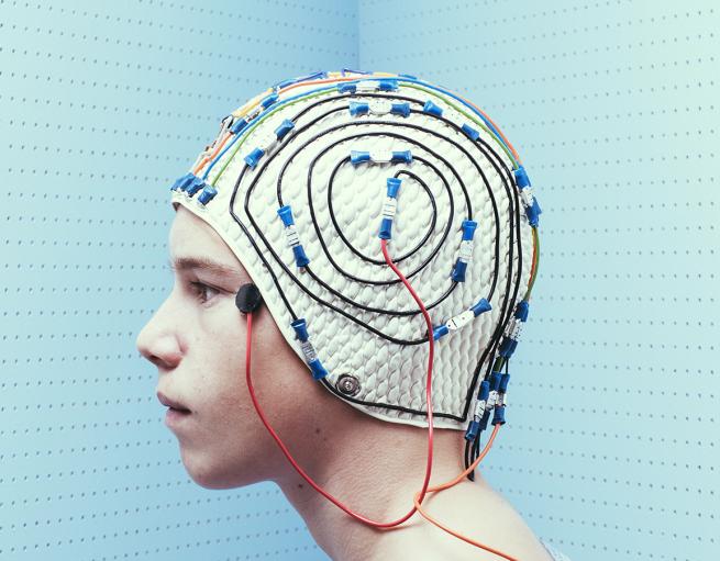 Patient wearing an electrode cap