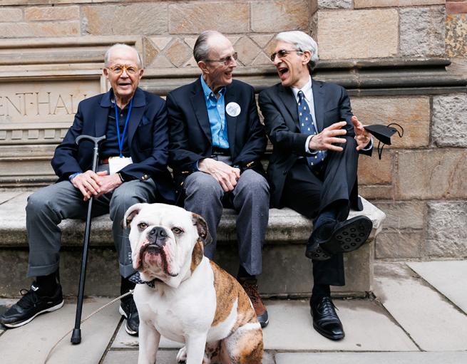 Members of the class of 1957 laugh with Yale President Peter Salovey