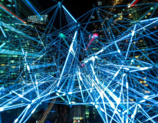 Beams of light evoking connectivity and technology