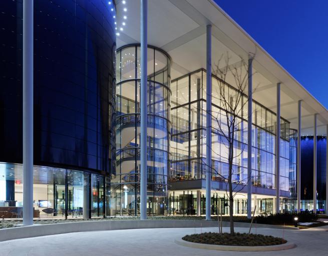 Exterior view of SOM's Edward P. Evans Hall at dusk