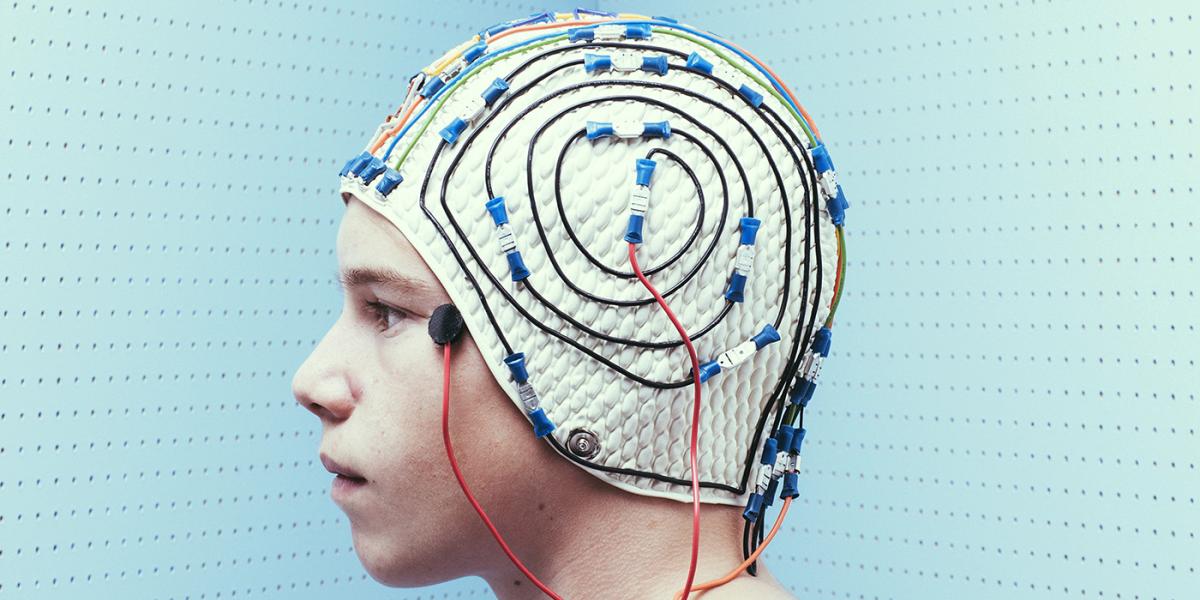 Patient wearing an electrode cap