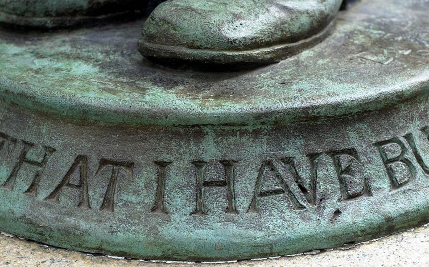 Detail of the patinated base of a statue of Nathan Hale