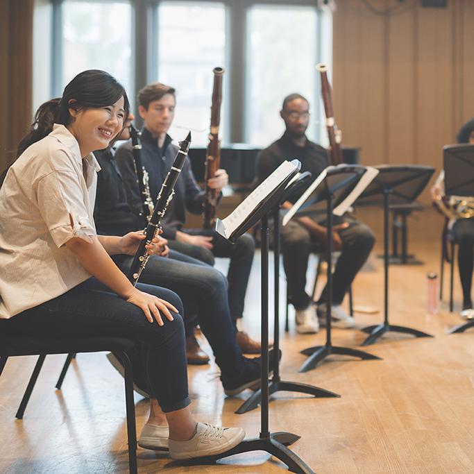 Yale School of Music students pause during an instrumental ensemble rehearsal