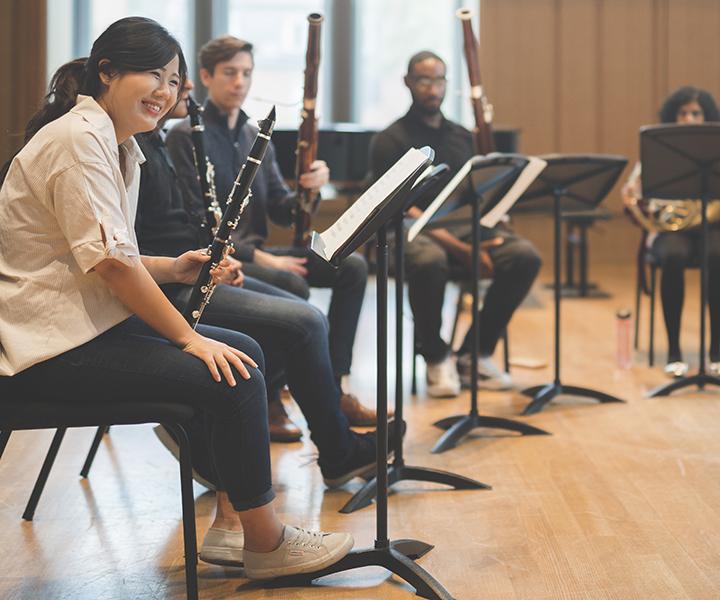 Yale School of Music students pause during an instrumental ensemble rehearsal