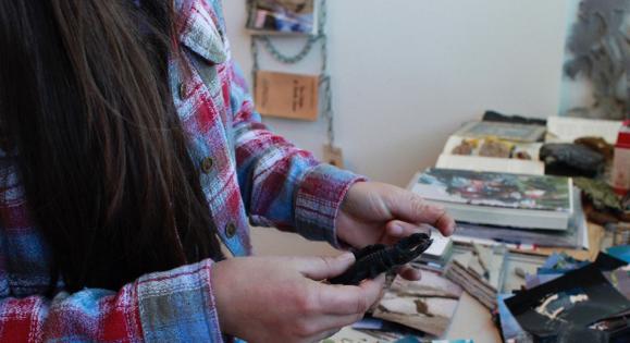 An art student working on a project