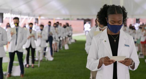 Med students at white coat ceremony