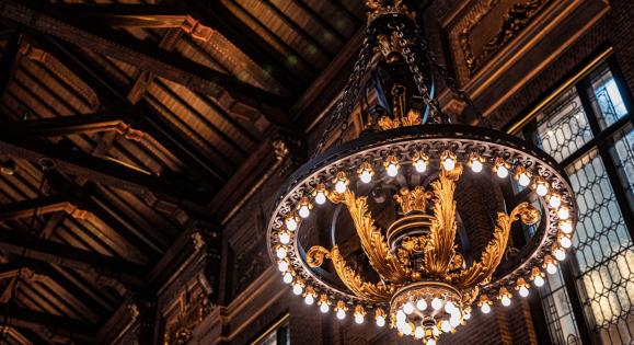 a chandelier on the ceiling of the Schwarzman Center