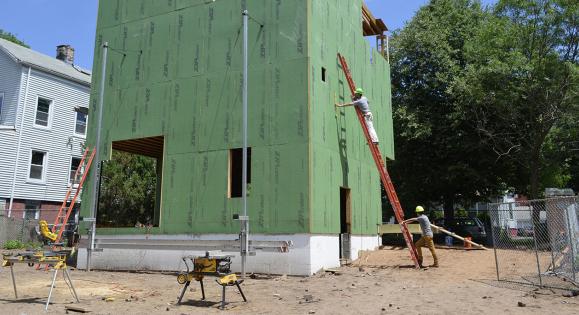 Architecture students at work on a construction site