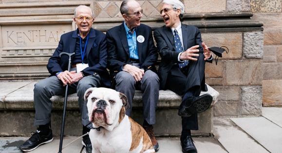 Members of the class of 1957 laugh with Yale President Peter Salovey
