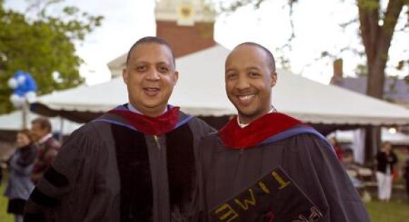 Will and Karreem at their father-son graduation in 2006