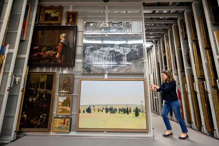 Paintings stored vertically on screens at Yale’s Library Shelving Facility in Hamden
