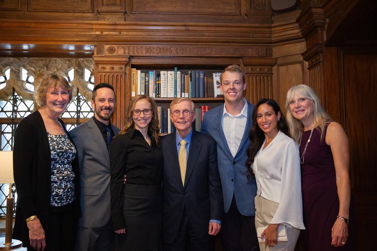 Fred Berg ’66 celebrates the reopening of the L&B Room with family members in the newly dedicated Berg Family Foyer.