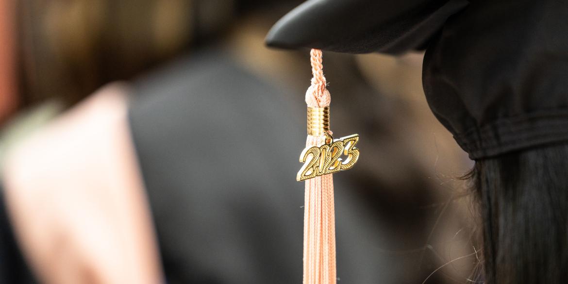 Close up view of a 2023 graduation cap tassle
